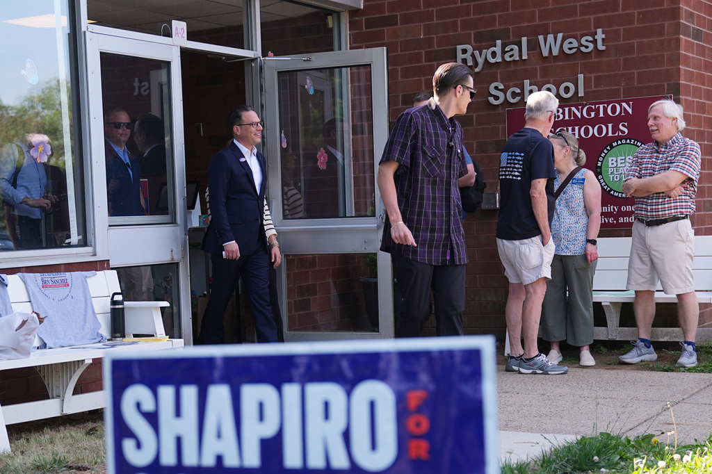 Pennsylvania Gov. Josh Shapiro walks out of his polling place in Rydal, Pa., Tuesday, May 19, 2026. (AP Photo/Matt Rourke)