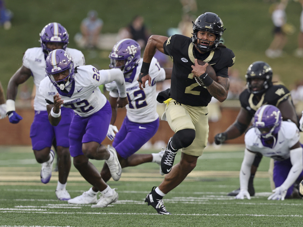 Wake Forest quarterback Robby Ashford finds a hole in the Western Carolina defense for a 41-yard touchdown run in the first half of an NCAA college football game, Saturday, Sept. 6, 2025, in Winston-Salem, N.C. (Walt Unks/Winston-Salem Journal via AP