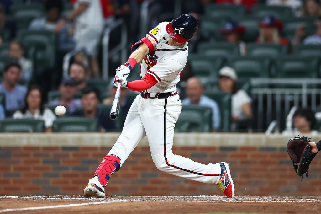 Atlanta Braves' Mike Yastrzemski hits an RBI single in the fourth inning of a baseball game against the Miami Marlins, Monday, April 13, 2026, in Atlanta. (AP Photo/Colin Hubbard)