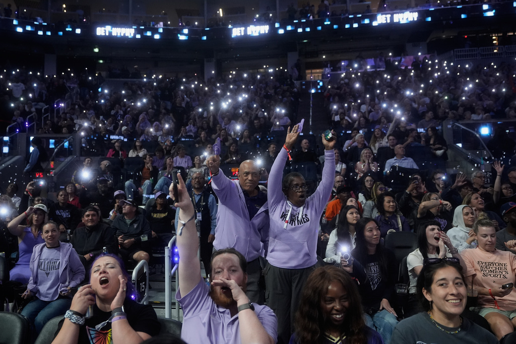 Fans at Chase Center cheer during a time out in the second half of a WNBA basketball game between the Golden State Valkyries and the Dallas Wings in San Francisco, Monday, Aug. 17, 2026. (AP Photo/Jeff Chiu)