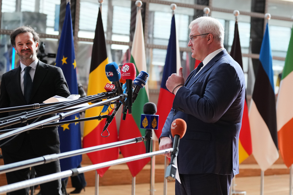 Ukraine's Foreign Minister Andrii Sybiha, right, speaks with the media as he arrives for a meeting of EU foreign ministers at the European Council building in Brussels, Monday, May 11, 2026. (AP Photo/Virginia Mayo)