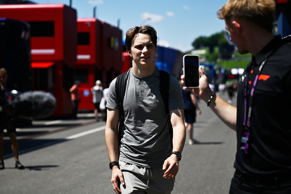 McLaren driver Oscar Piastri of Australia walks through the paddock as he arrives for the Austrian F1 Grand Prix, in Spielberg, Austria, Thursday, June 25, 2026. (AP Photo/Denes Erdos)