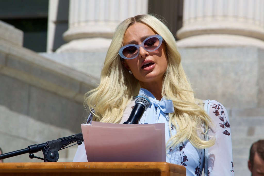 Paris Hilton calls for a crackdown on the so-called troubled teen industry, Monday, June 15, 2026, in Provo, Utah. (AP Photo/Hannah Schoenbaum)