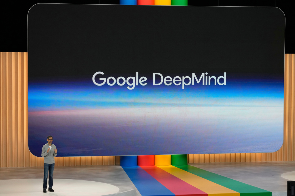 FILE - Alphabet CEO Sundar Pichai speaks about Google DeepMind at a Google I/O event in Mountain View, Calif., Wednesday, May 10, 2023. (AP Photo/Jeff Chiu, File)