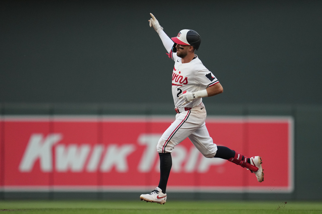 Minnesota Twins' Kody Clemens (2) runs the bases after hitting a solo home run during the third inning of a baseball game against the Kansas City Royals, Thursday, June 4, 2026, in Minneapolis. (AP Photo/Abbie Parr)