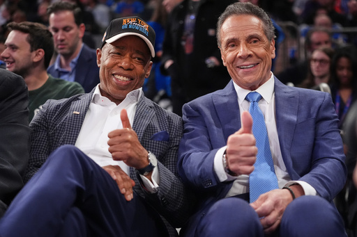 New York City Mayor Eric Adams, left, and Independent candidate former New York Gov. Andrew Cuomo, right, pose during the second half of an NBA basketball game between the New York Knicks and the Cleveland Cavaliers Wednesday, Oct. 22, 2025, at Madison Square Garden in New York. (AP Photo/Frank Franklin II) New York City Mayor Eric Adams, left, and Independent candidate former New York Gov. Andrew Cuomo, right, pose during the second half of an NBA basketball game between the New York Knicks and the Cleveland Cavaliers Wednesday, Oct. 22, 2025, at Madison Square Garden in New York. (AP Photo/Frank Franklin II)