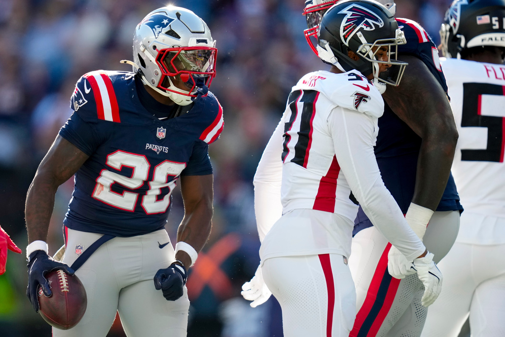 New England Patriots running back Terrell Jennings (26) celebrates a run against the Atlanta Falcons during the first half of an NFL football game, Sunday, Nov. 2, 2025, in Foxborough, Mass. (AP Photo/Charles Krupa)