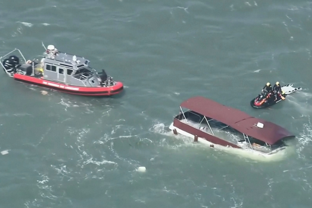 This image made from video provided by KGO-TV shows first responders reacting to a sinking boat Tuesday, July 14, 2026, in the waters off of San Francisco. (KGO via AP)