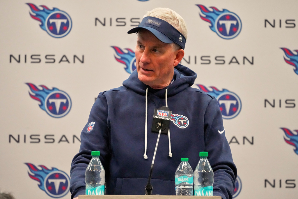 Tennessee Titans head coach Mike McCoy talks during a news conference after an NFL football game between the Tennessee Titans and the Jacksonville Jaguars Sunday, Nov. 30, 2025, in Nashville, Tenn. (AP Photo/George Walker IV)