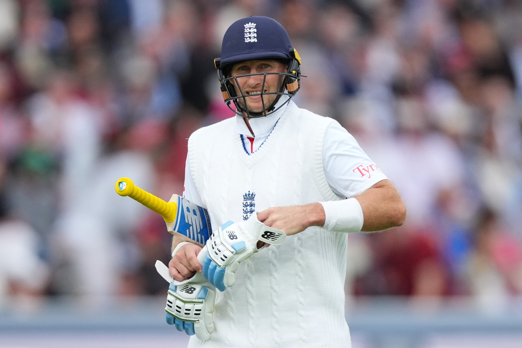 FILE - England's Joe Root leaves the pitch after losing his wicket during the second day of the test match between England and New Zealand at Lord's cricket ground in London, Friday, June 5, 2026. (AP Photo/Kirsty Wigglesworth, File)
