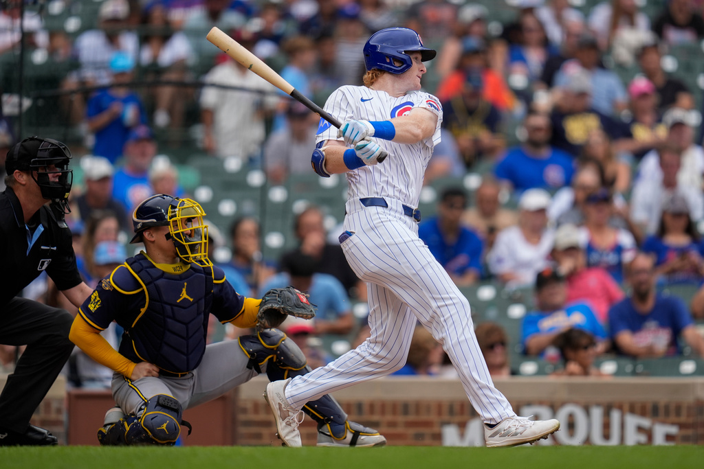 FILE - Chicago Cubs' Owen Caissie hits his first major league career home run during the sixth inning in the first baseball game of a doubleheader against the Milwaukee Brewers, Aug. 19, 2025, in Chicago. (AP Photo/Erin Hooley, File)