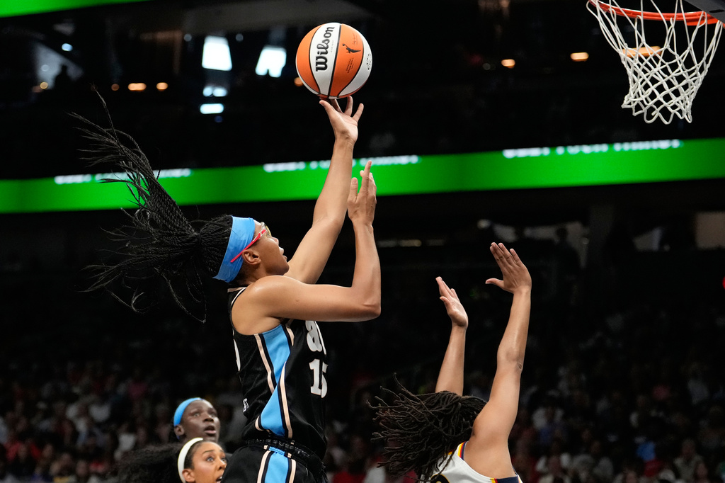 Atlanta Dream guard Allisha Gray (15) scores in the first half of an WNBA basketball game against the Indiana Fever Sunday, Aug. 16, 2026, in Atlanta. (AP Photo/Brynn Anderson)