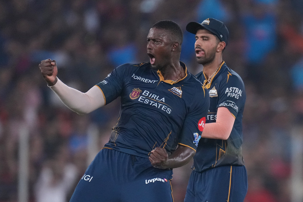 Gujarat Titans' Jason Holder celebrates the wicket of Royal Challengers Bengaluru's Jitesh Sharma during the Indian Premier League cricket match between Gujarat Titans and Royal Challengers Bengaluru in Ahmedabad, India, Thursday, April 30, 2026. (AP Photo/Ajit Solanki)