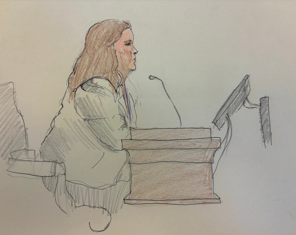 CORRECTS IDENTIFICATION This courtroom sketch depicts show FBI agent Erin Lucker on the stand during Milwaukee County Circuit Judge Hannah Dugan trial on Monday, Dec. 15, 2025 in Milwaukee, Wis. (Adela Tesnow via AP, Pool)