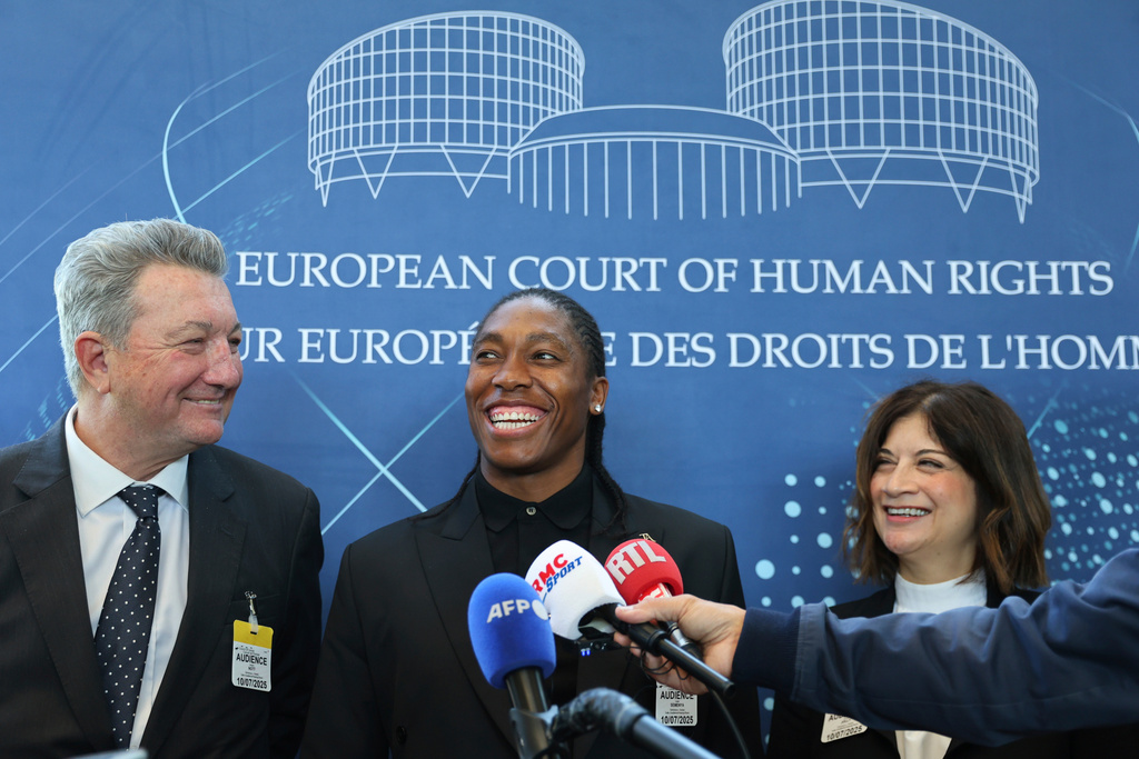 FILE - South Africa athlete Caster Semenya, center, answers reporters with lawyers Gregory Nott, left, and Shona Jolly KC after Semenya won a partial victory at the European Court of Human Rights on in her seven-year legal fight against track and field's sex eligibility rules, Thursday, July 10, 2025 in Strasbourg, eastern France. (AP Photo/Antonin Utz, File)