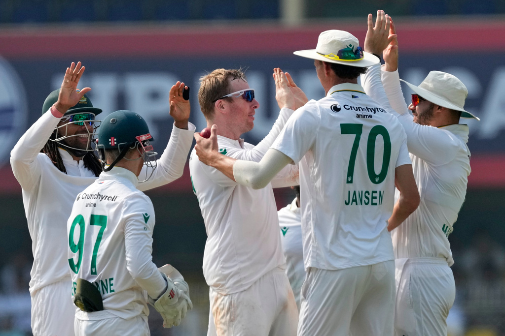 South Africa's players celebrate the dismissal of India's Yashasvi Jaiswal on the third day of the second cricket test match between India and South Africa in Guwahati, India, Saturday, Nov. 22, 2025. (AP Photo/Anupam Nath)