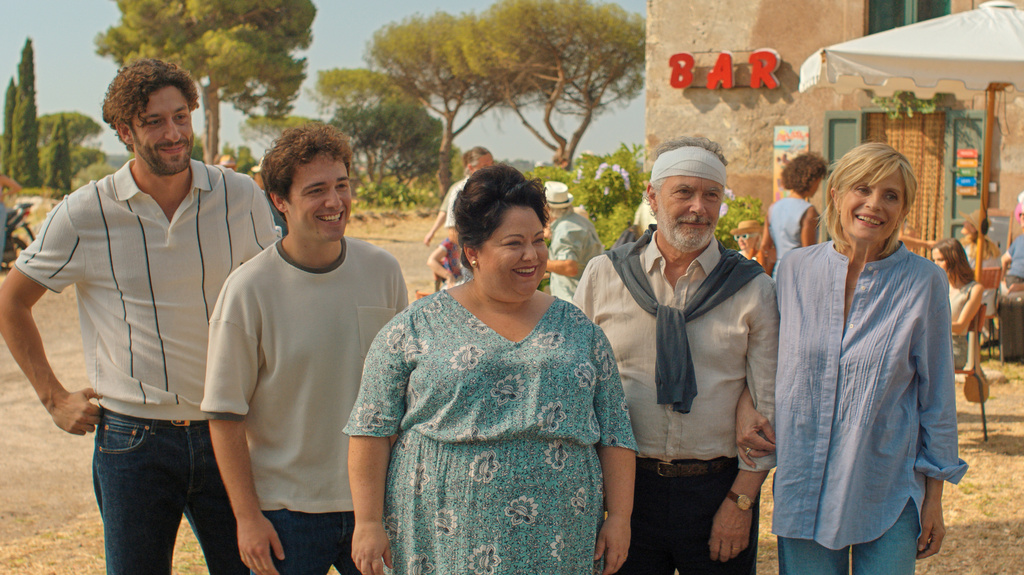 This image released by Universal Pictures shows, from left, Lorenzo de Moor, Tommaso Cassissa, Stella Pecollo, Paolo Sassanelli and Isabella Ferrari in a scene from "You, Me & Tuscany." (Universal Pictures via AP)