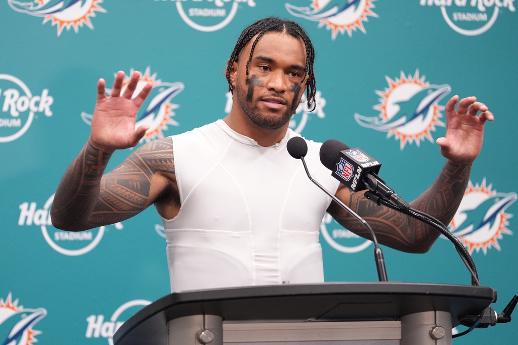 Miami Dolphins quarterback Tua Tagovailoa speaks at a news conference after the Los Angeles Chargers defeated the Dolphins 29-27 in an NFL football game Sunday, Oct. 12, 2025, in Miami Gardens, Fla. (AP Photo/Rebecca Blackwell)