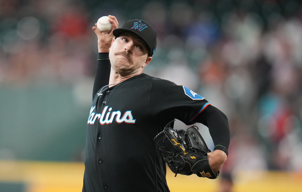Miami Marlins starting pitcher Janson Junk delivers to Houston Astros' Yordan Alvarez during the first inning of a baseball game, Monday, July 20, 2026, in Houston. (AP Photo/Karen Warren)