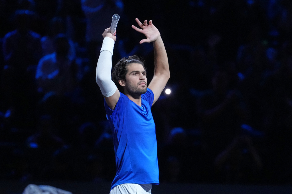 Team Europe's Carlos Alcaraz celebrates after beating Team World's Taylor Fritz during a Laver Cup tennis tournament match in London, Saturday, Sept. 26, 2026. (AP Photo/Maja Smiejkowska)
