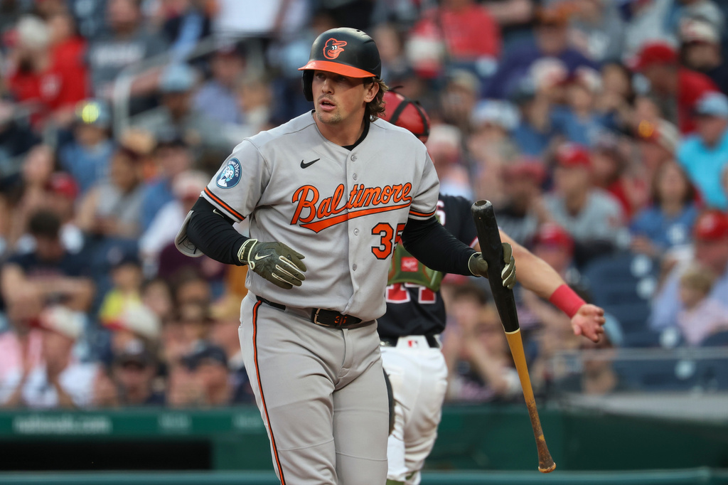 Baltimore Orioles' Adley Rutschman walks off the field after striking out against Washington Nationals pitcher Zack Littell during the third inning of a baseball game, Friday, May 15, 2026, in Washington. (AP Photo/Terrance Williams)