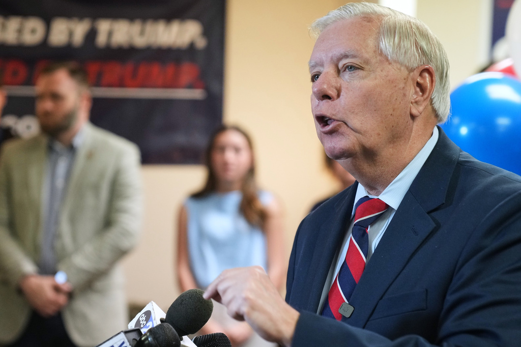 Sen. Lindsey Graham, R-S.C., speaks with supporters after filing his reelection paperwork Monday, March 16, 2026, in Columbia, S.C. (AP Photo/Meg Kinnard)