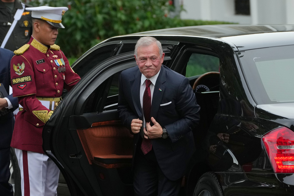Jordanian King Abdullah II steps out of his car upon arrival for a meeting with Indonesian President Prabowo Subianto at Merdeka Palace in Jakarta, Indonesia, Friday, Nov. 14, 2025. (AP Photo/Achmad Ibrahim)