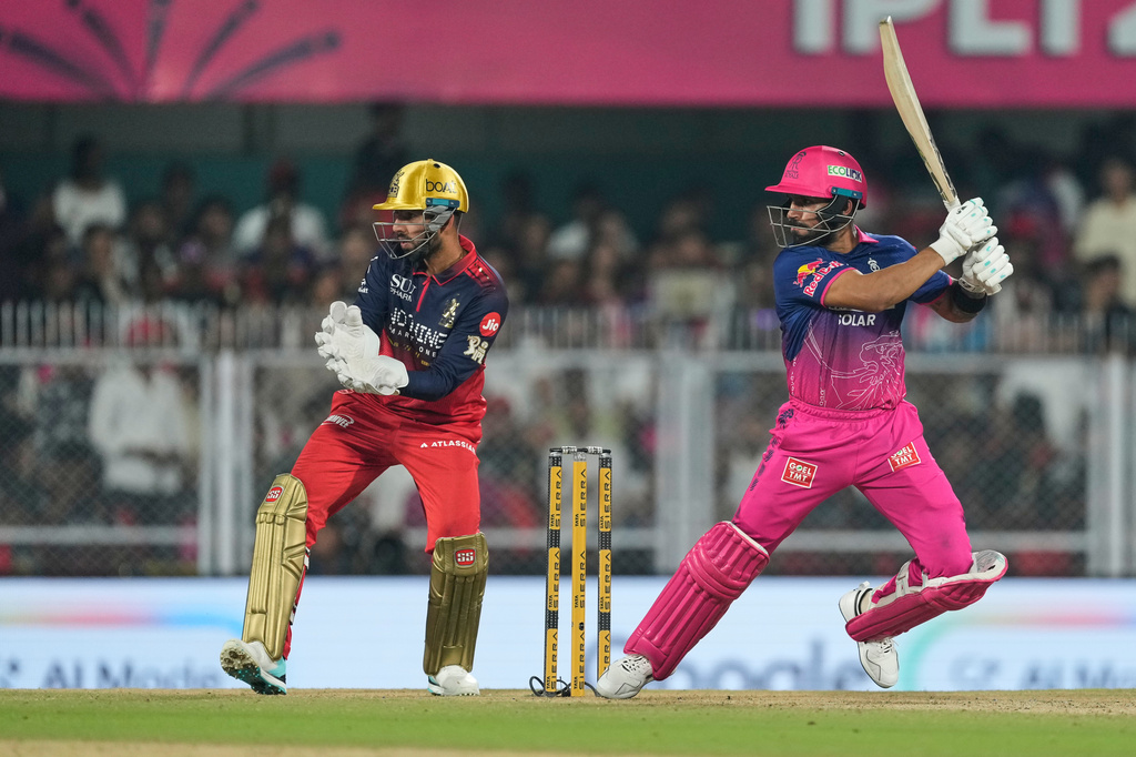 Rajasthan Royals' Dhruv Jurel hits a boundary during the Indian Premier League cricket match between Royal Challengers Bengaluru and Rajasthan Royals in Guwahati, India, Friday, April 10, 2026. (AP Photo/Anupam Nath)