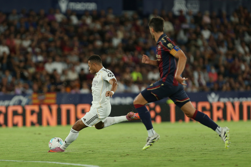 Real Madrid's Kylian Mbappe tries to score during a Spanish La Liga soccer match between Levante and Real Madrid at the Ciutat de Valencia stadium in Valencia, Spain, Tuesday, Sept. 23, 2025. (AP Photo/Alberto Saiz)