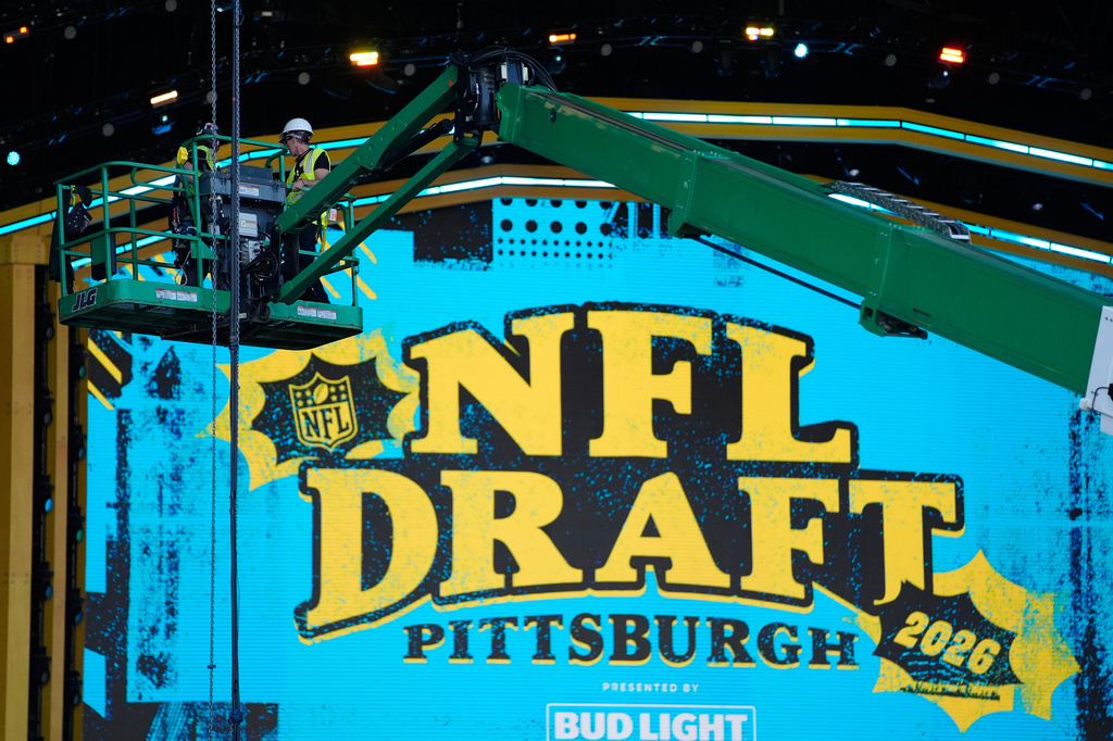 Workers prepare the draft theater ahead of the NFL Draft Tuesday, April 21, 2026, in Pittsburgh. (AP Photo/John Locher)