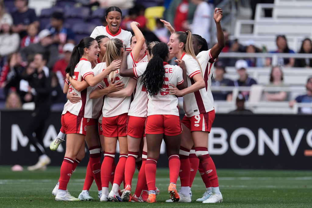 Team Canada celebrates a goal during the second half of a SheBelieves Cup women's soccer tournament match against Colombia, Sunday, March 1, 2026, in Nashville, Tenn. (AP Photo/George Walker IV)