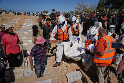 Bodies of unidentified Palestinians returned from Israel are buried in a mass grave in Deir al-Balah, Gaza Strip, Monday, Oct. 27, 2025. (AP Photo/Jehad Alshrafi) Bodies of unidentified Palestinians returned from Israel are buried in a mass grave in Deir al-Balah, Gaza Strip, Monday, Oct. 27, 2025. (AP Photo/Jehad Alshrafi)