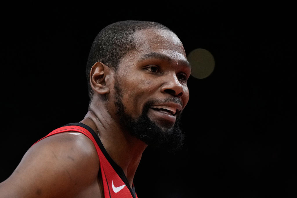 Houston Rockets forward Kevin Durant reacts during a penalty shot during the first half of an NBA basketball game against the Atlanta Hawks in Houston, Friday, March 20, 2026. (AP Photo/Ashley Landis)