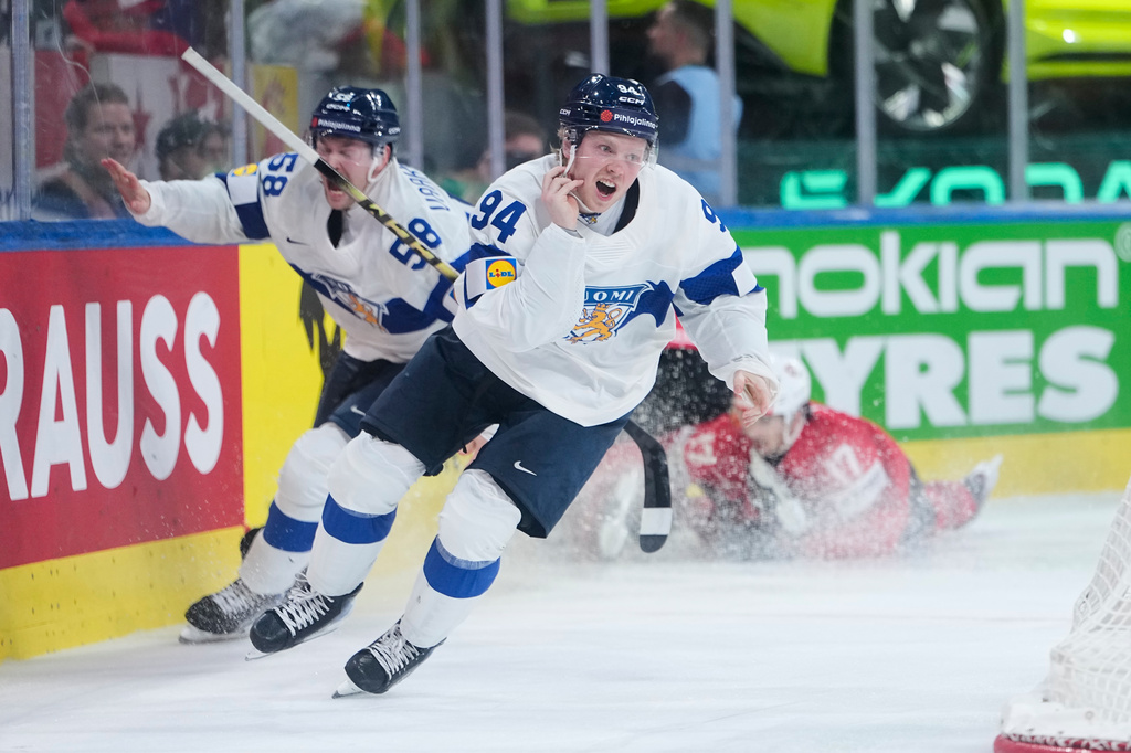 Finland's Konsta Helenius celebrates after scoring his side's opening goal during the 2026 IIHF Men's Ice Hockey World Championship final match between Switzerland and Finland, in Zurich, Switzerland, Sunday, May 31, 2026. (AP Photo/Darko Bandic)