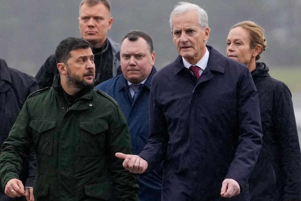 Norway's Prime Minister Jona Gahr Støre, right, welcomes Ukrainian President Volodymyr Zelenskyy on his arrival, at Gardermoen, Norway, Wednesday, Oct. 22, 2025. (Javad Parsa/NTB Scanpix via AP)