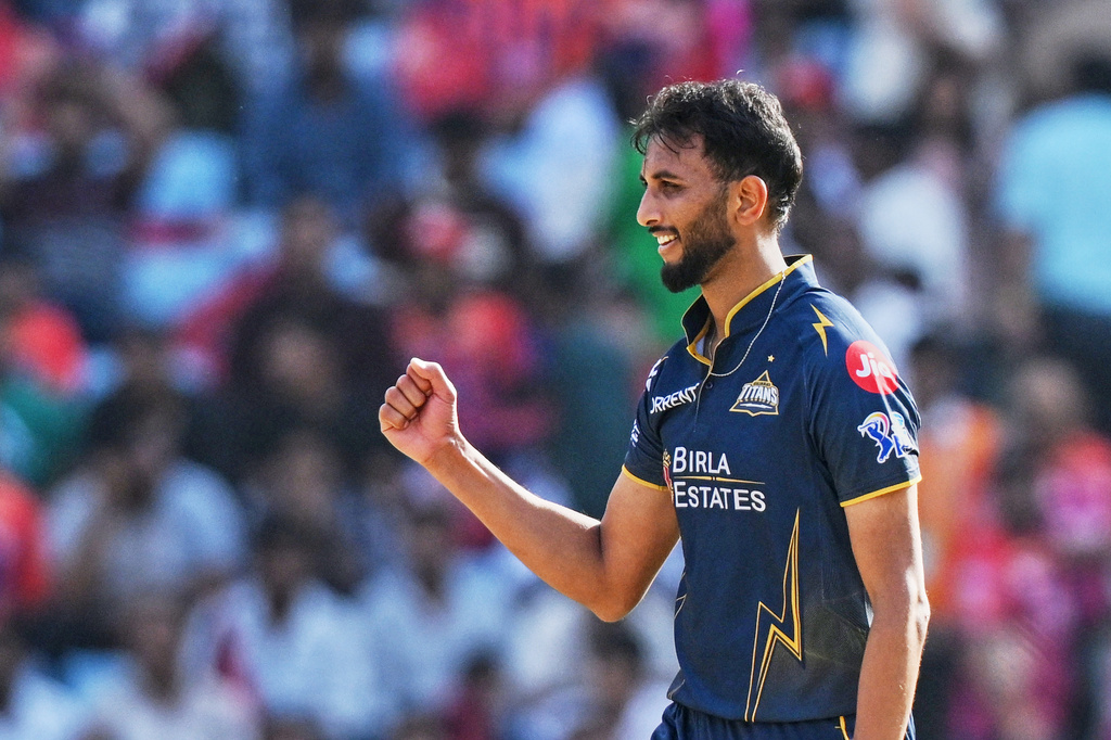 Gujarat Titans' Prasidh Krishna celebrates the wicket of Lucknow Super Giants' Aiden Markram during the Indian Premier League cricket match between Gujarat Titans and Lucknow Super Giants in Lucknow, India, Sunday, April 12, 2026. (AP Photo/Str)