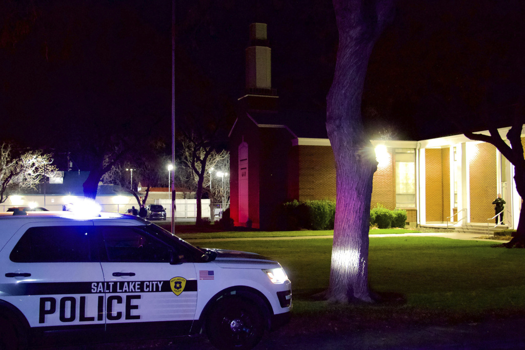 CORRECTS YEAR TO 2026 - Police respond to a fatal shooting in a parking lot of The Church of Jesus Christ of Latter-day Saints in Salt Lake City on Wednesday, Jan. 7, 2026. (AP Photo/Hannah Schoenbaum)