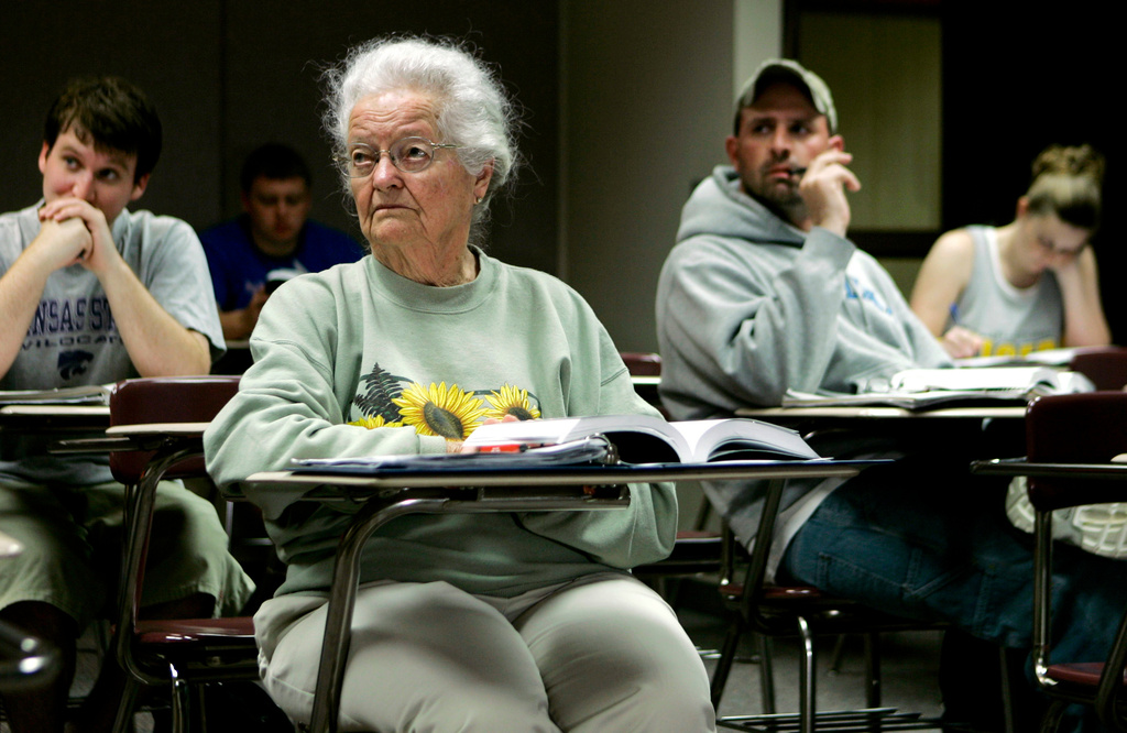 FILE - In this April 23, 2007 file photo, Nola Ochs listens to a lecture during a class at Fort Hays State University in Hays, Kan. (AP Photo/Charlie Riedel, File)