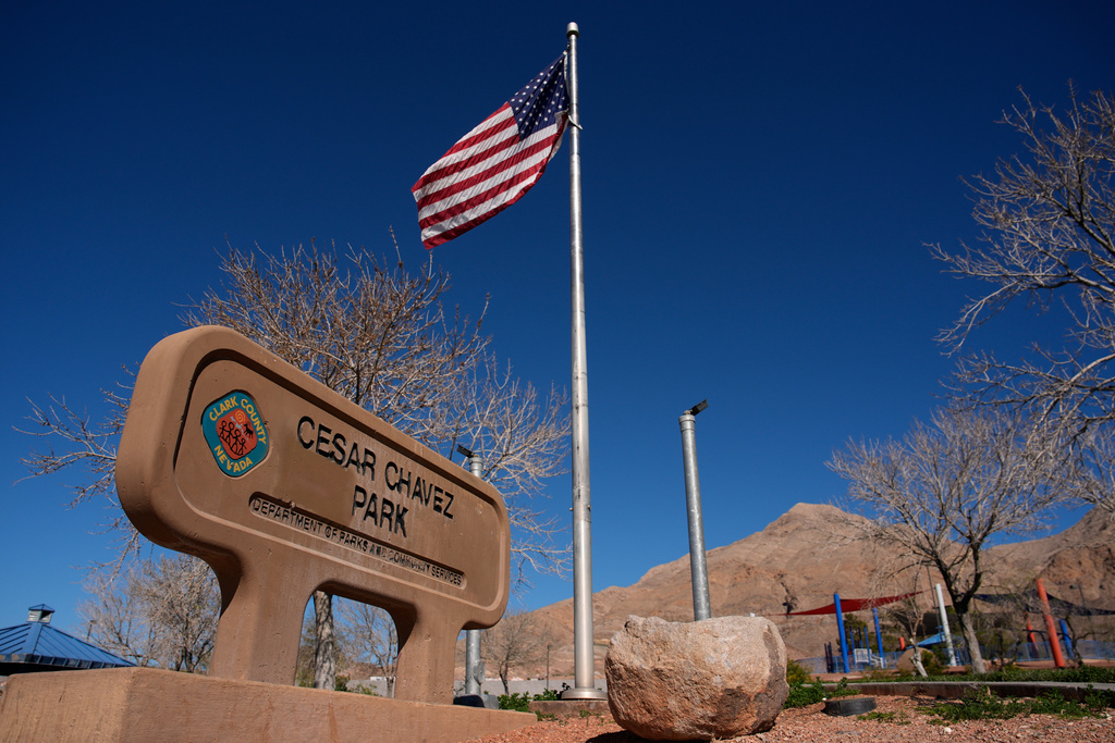 A sign advertises César Chavez Park, Thursday, March 19, 2026, in Las Vegas. (AP Photo/John Locher)