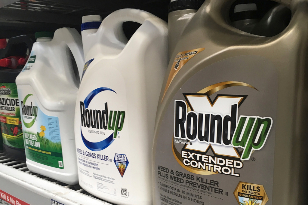 FILE - Containers of Roundup are displayed on a store shelf on Feb. 24, 2019, in San Francisco. (AP Photo/Haven Daley, File)