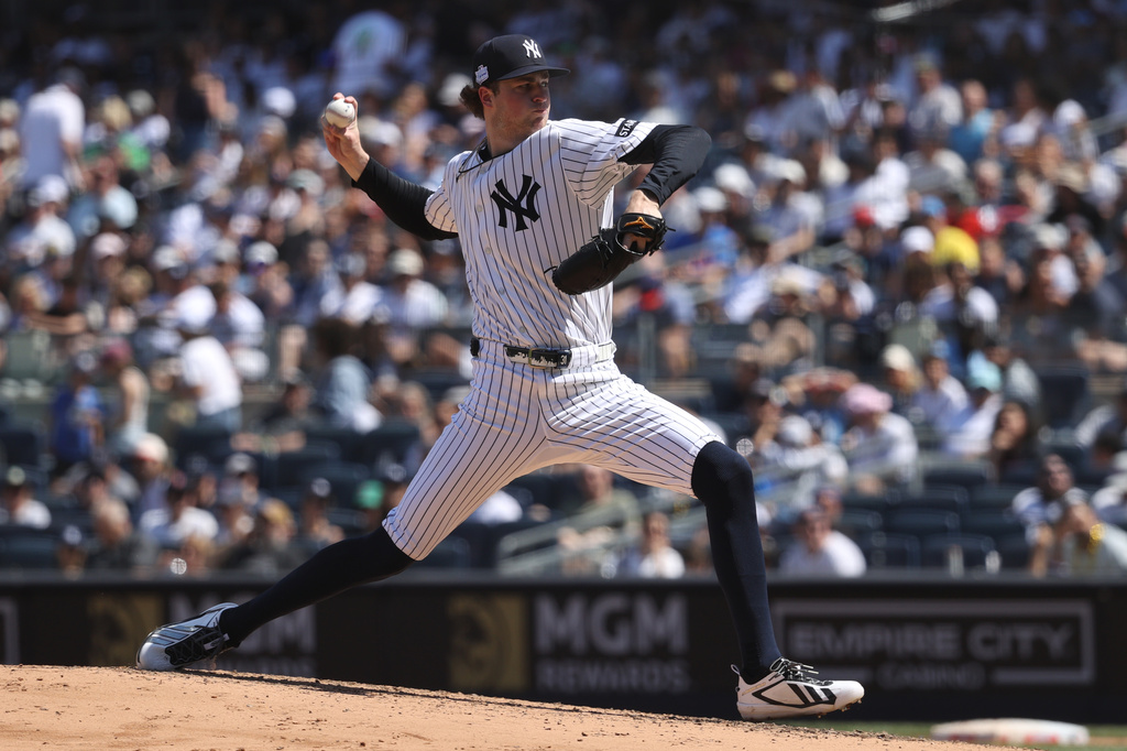 New York Yankees pitcher Cam Schlittler throws during the fifth inning of a baseball game against the Boston Red Sox, Sunday, June 7, 2026, in New York. (AP Photo/Pamela Smith)