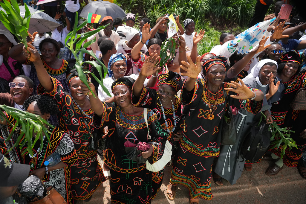 People wait for Pope Leo XIV in Bamenda, Cameroon, Thursday, April 16, 2026, on the fourth day of his 11-day pastoral visit to Africa. (AP Photo/Andrew Medichini)