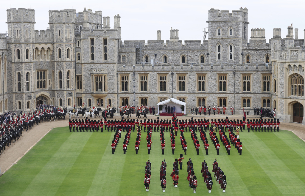 Britain's Kate, Princess of Wales, Prince William, first lady Melania Trump, President Donald Trump, Britain's King Charles III and Queen Camilla review the Guard of Honour at Windsor Castle in Windsor, England, Wednesday Sept. 17, 2025. (Chris Jackson/Pool Photo via AP)