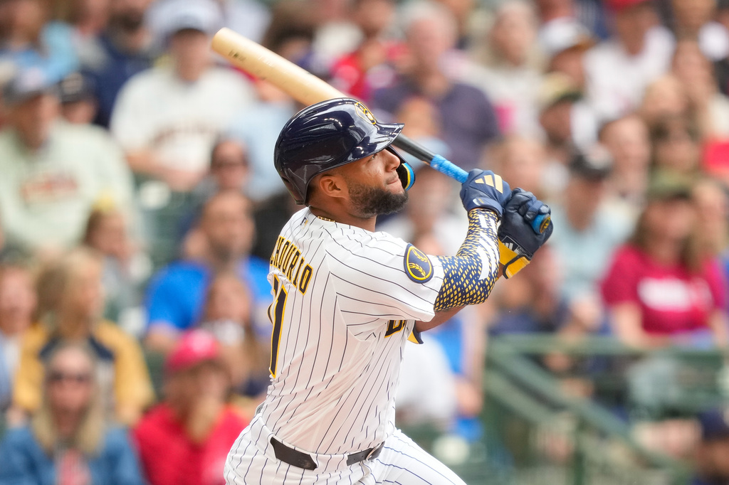 Milwaukee Brewers' Jackson Chourio hits a home run during the first inning of a baseball game against the Philadelphia Phillies, Sunday, June 14, 2026, in Milwaukee. (AP Photo/Kayla Wolf)