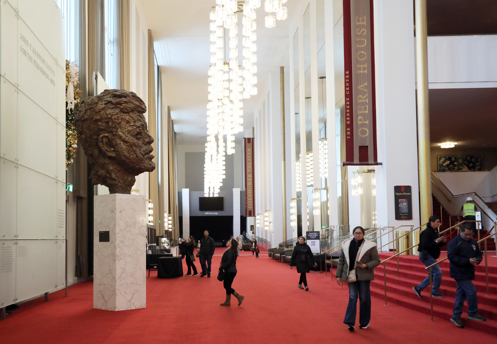 FILE - Visitors walk at the John F. Kennedy Memorial Center for the Performing Arts, Nov. 22, 2025, in Washington. (AP Photo/Rahmat Gul, File)