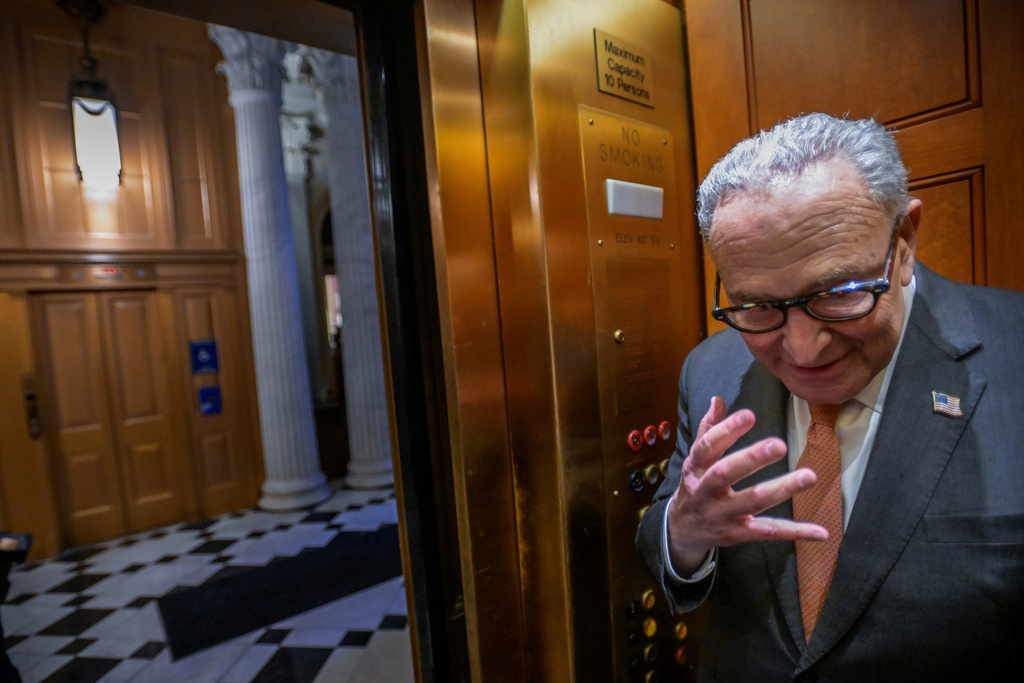 Senate Minority Leader Charles Schumer, D-N.Y., boards an elevator during a Senate war powers vote on Capitol Hill, Wednesday, March 4, 2026, in Washington. (AP Photo/Rod Lamkey, Jr.)