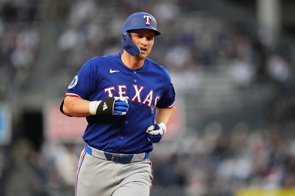 Texas Rangers' Corey Seager runs the bases after hitting a home run during the first inning of a baseball game against the New York Yankees Wednesday, May 6, 2026, in New York. (AP Photo/Frank Franklin II)