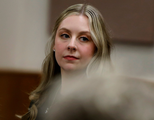 Former Richneck Elementary School teacher Abby Zwerner looks back into the courtroom during her civil lawsuit trial, Tuesday, Oct. 28, 2025, in Newport News, Va. (Stephen M. Katz/The Virginian-Pilot via AP, Pool) Former Richneck Elementary School teacher Abby Zwerner looks back into the courtroom during her civil lawsuit trial, Tuesday, Oct. 28, 2025, in Newport News, Va. (Stephen M. Katz/The Virginian-Pilot via AP, Pool)