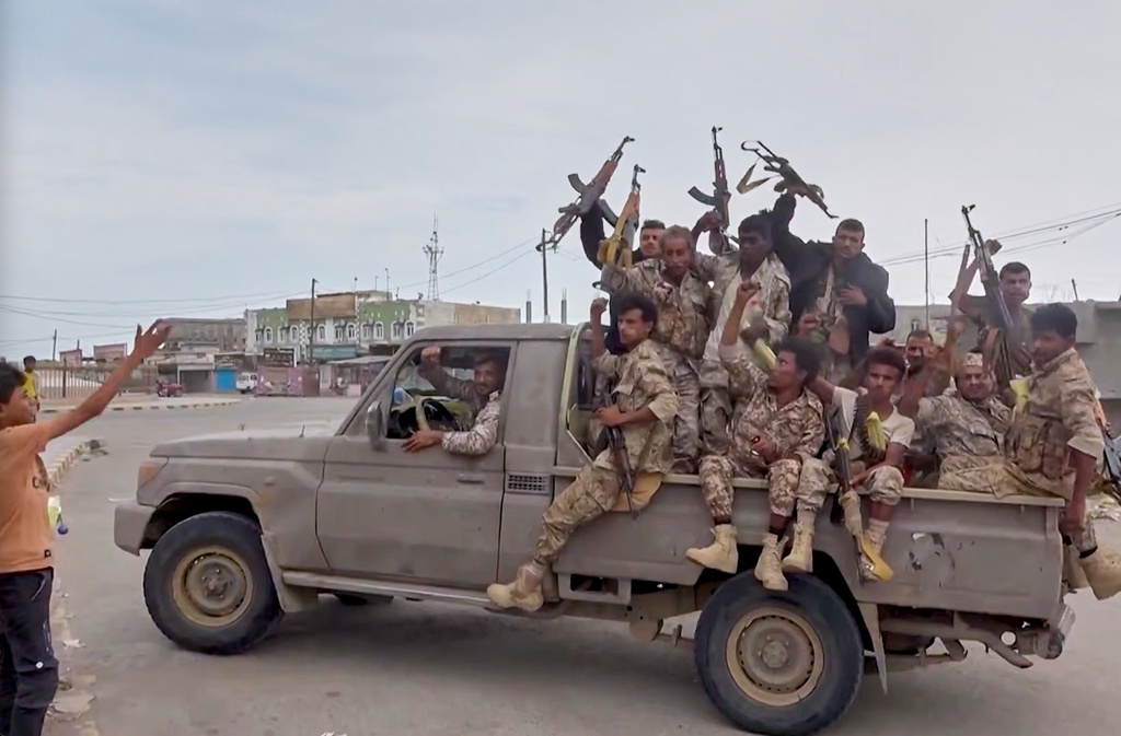 This image taken from undated video released by Al-Masirah TV, a channel owned by Yemen's Houthi rebels, on Friday, Sept. 11, 2026, shows, according to the channel, Houthi fighters chanting atop a pickup truck in Khawkhah, Hodeida province, Yemen. (Al-Masirah TV via AP)