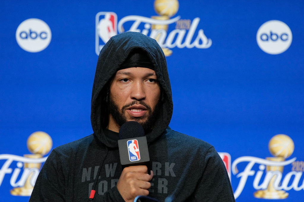 New York Knicks guard Jalen Brunson speaks during a news conference prior to Game 5 of the NBA Finals basketball series against the San Antonio Spurs, Friday, June 12, 2026, in San Antonio. (AP Photo/Ross D. Franklin)
